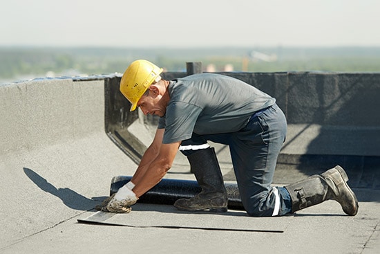 Man Working on Roof