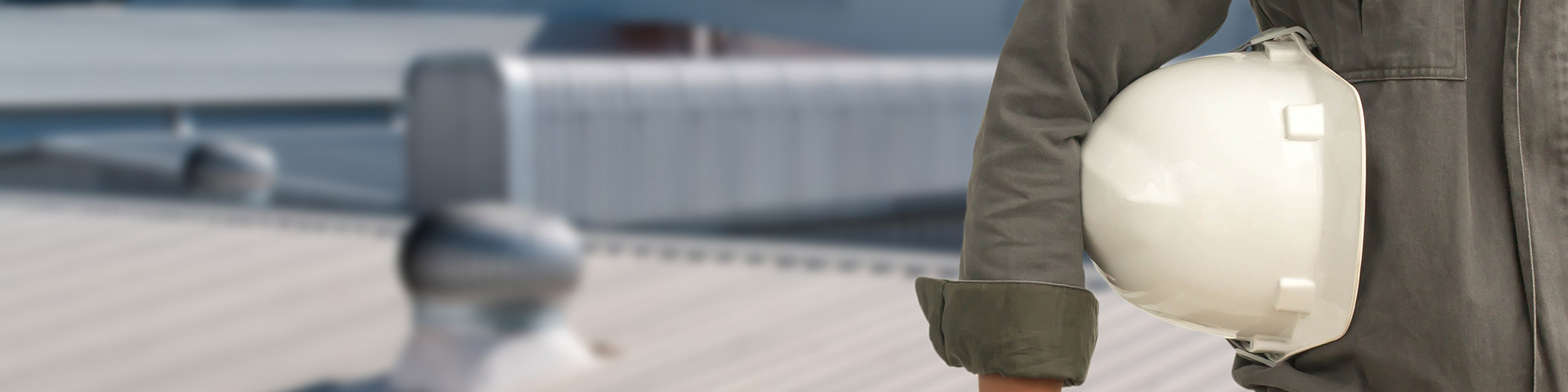 Repairman on Commercial Roof