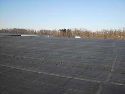 A black EPDM-covered flat roof.