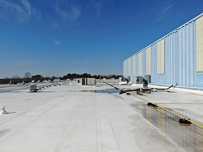 A commercial roof with standing water issues.