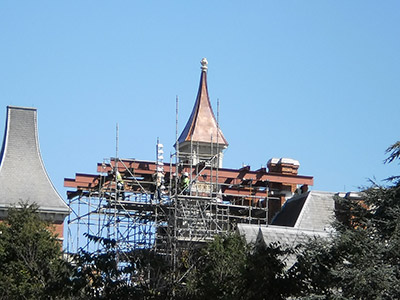 Roofers working on the Shepard-Pratt Health System roof in Baltimore, MD.