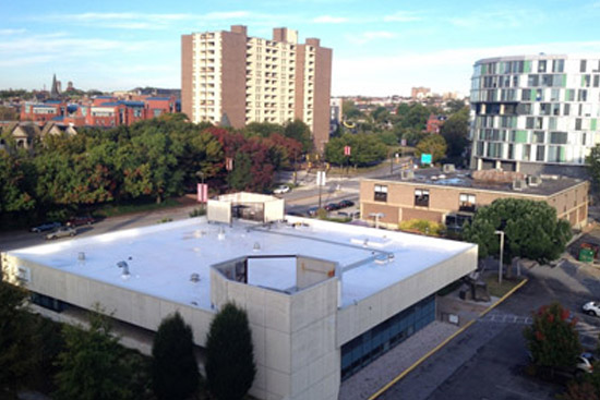 A commercial building with a TPO roof