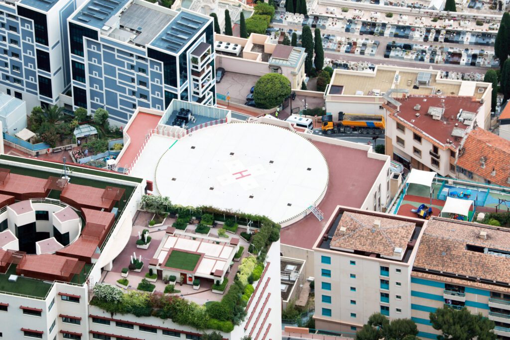 A helicopter landing pad on top of a hospital.