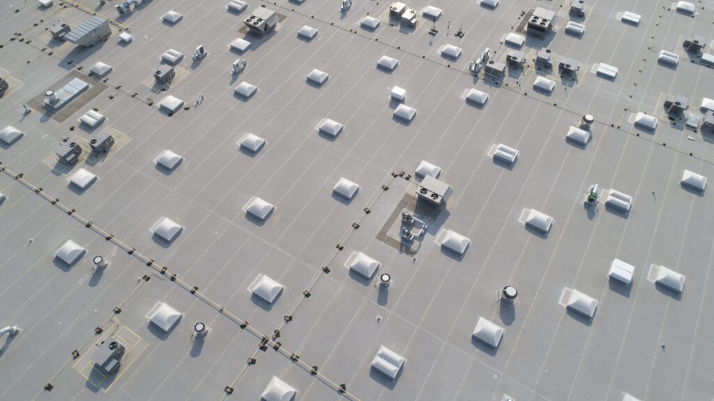 An aerial view of the top of a large commercial building.