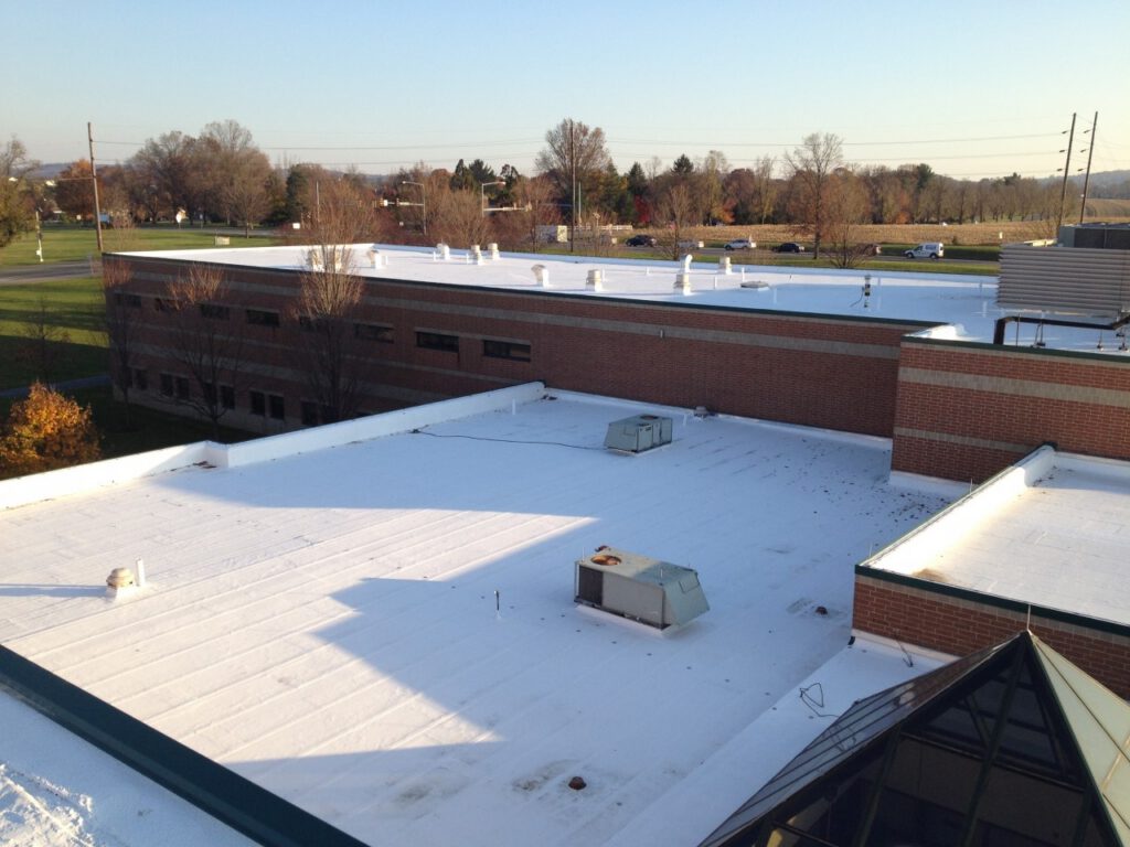 Commercial roof with elastomeric coating installed by Heidler Roofing